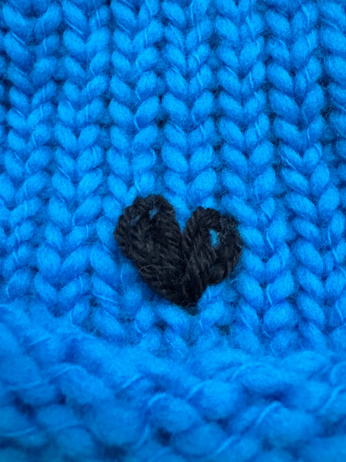 crafted merino wool beanie with heart embroidery